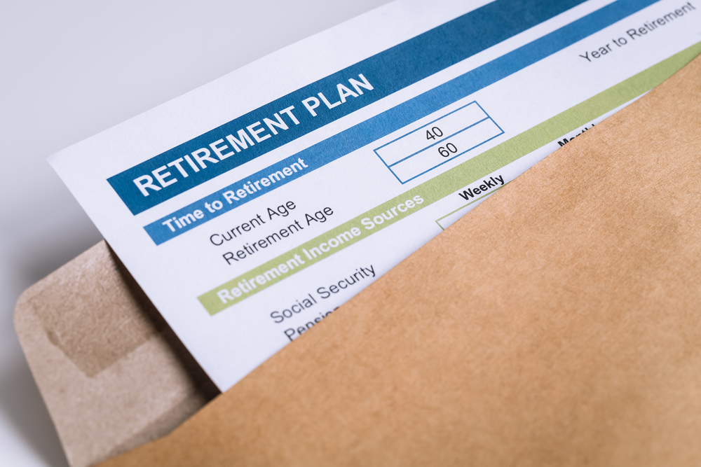 Retirement,planning,letter,in,brown,envelope,opening,,business,concept
